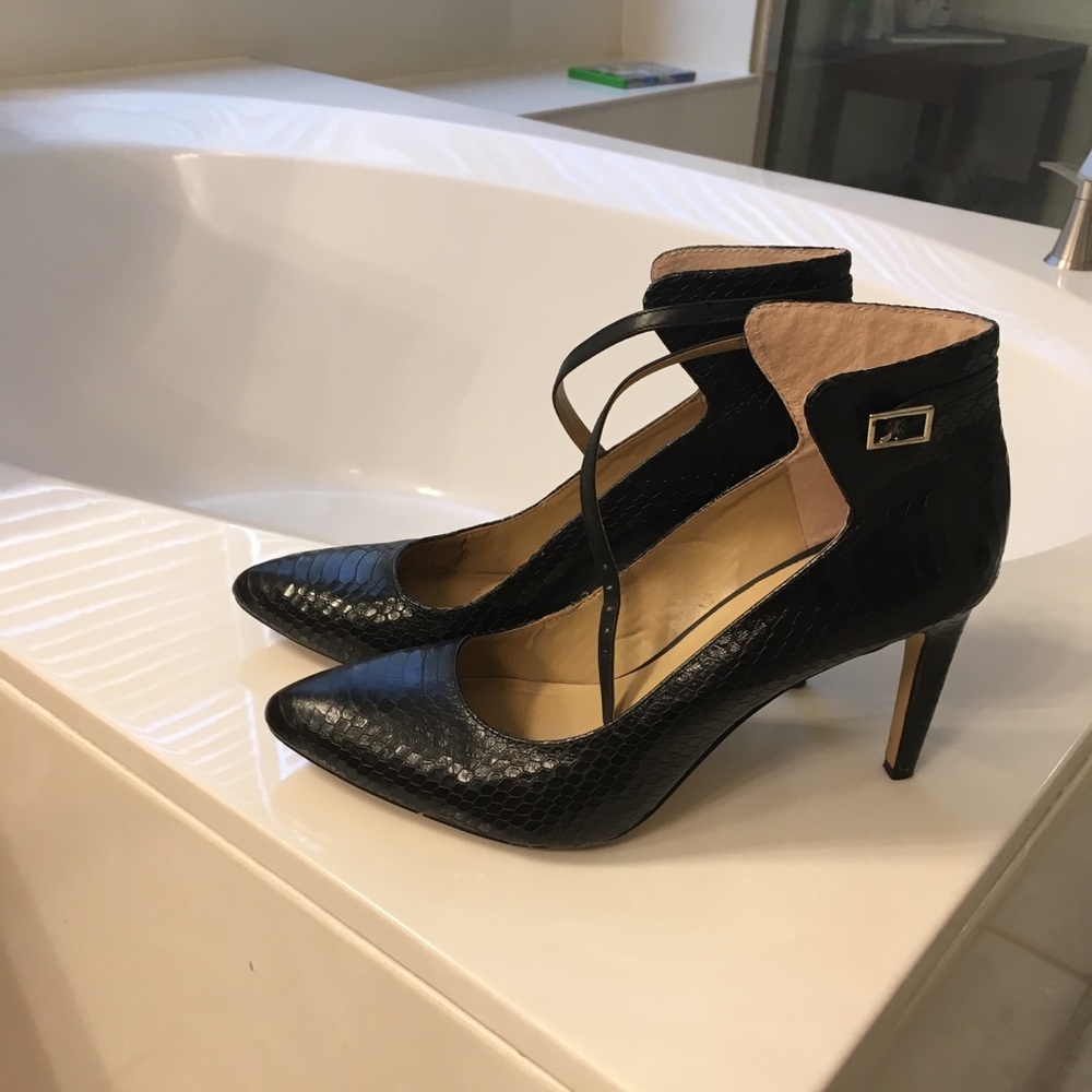 Black leather ankle-strap pumps